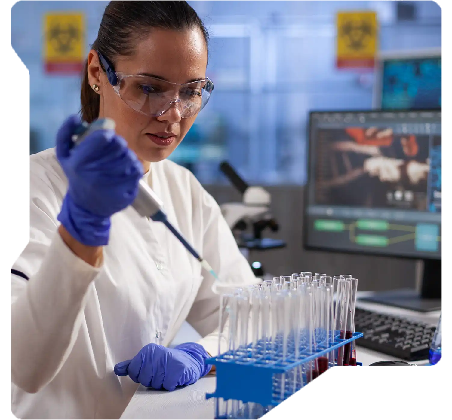 Researcher analyzing drug development data with predictive tools