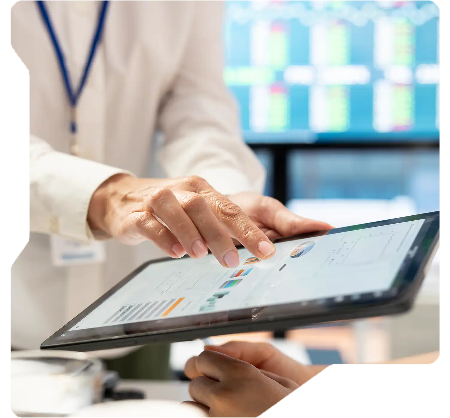 Researcher analyzing drug development data with predictive tools