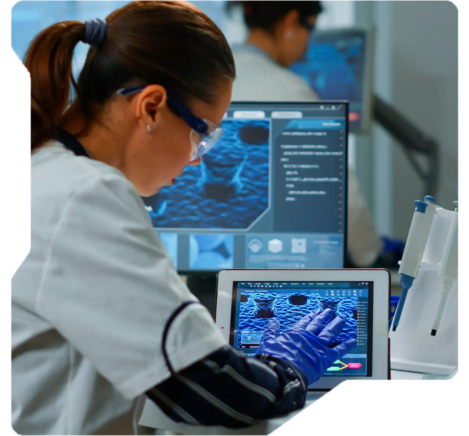 Scientist working in drug research laboratory