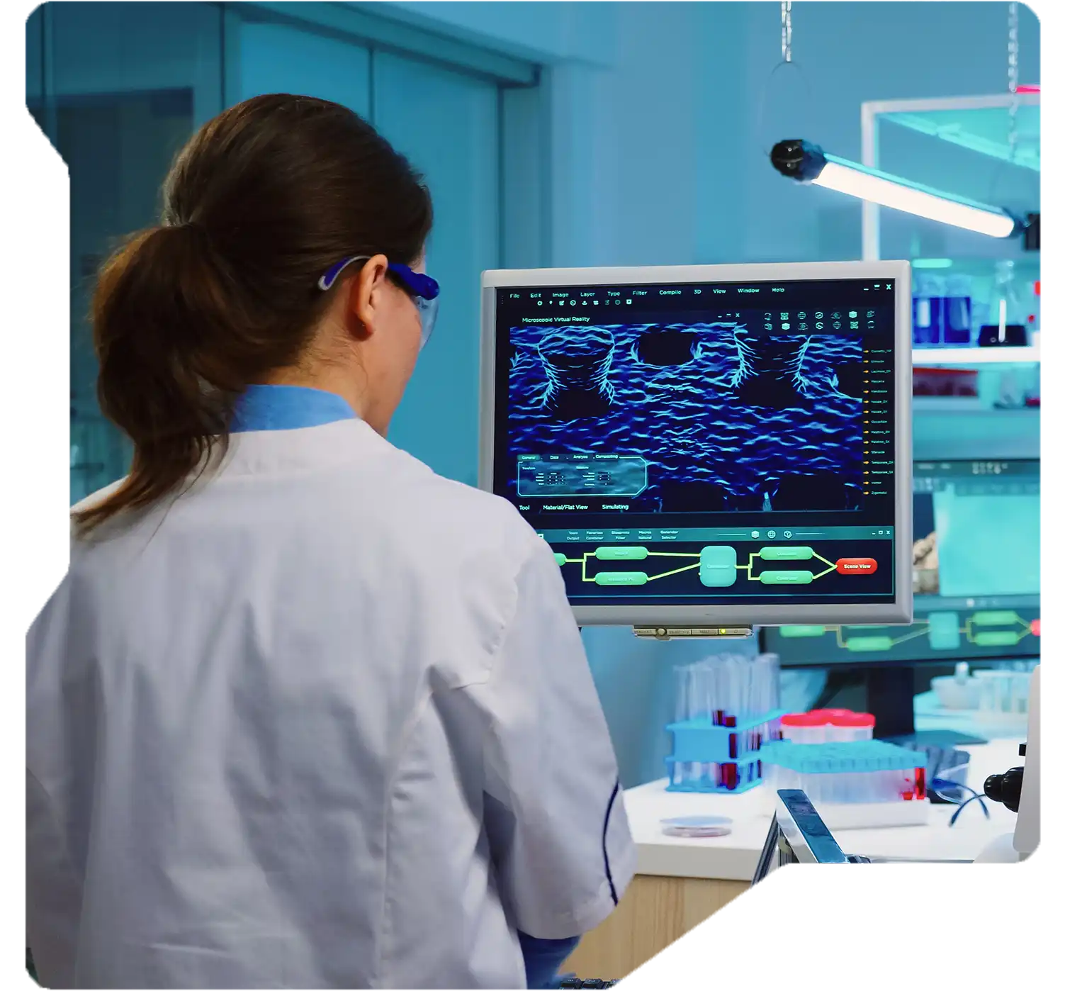 Researcher analyzing drug development data with predictive tools